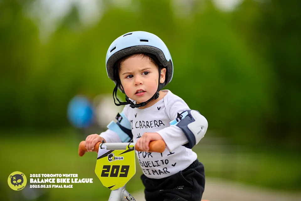 Trophies arranged on the 1st, 2nd, and 3rd place podiums at Joyride150 — the XKIDS Balance Bike League awards display from the January 2025 opening race.